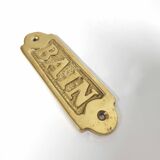 Brass bathroom door plate