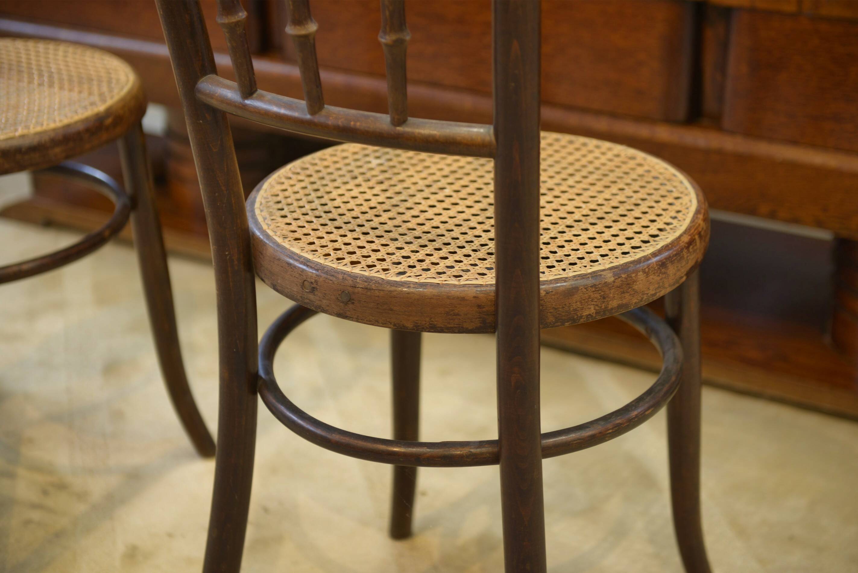 Pair of curved wooden bistro chairs stamped Fischel 1930s