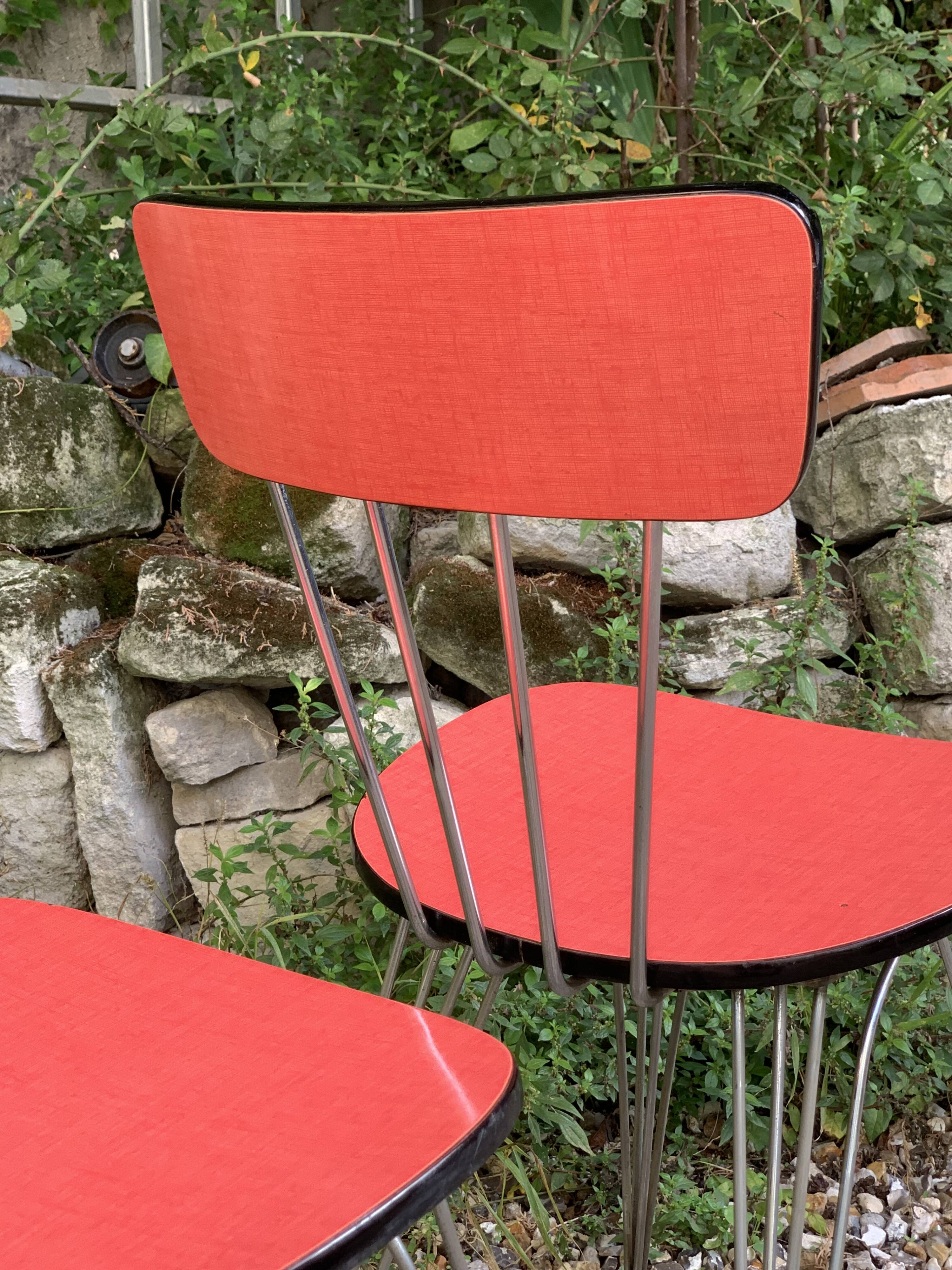 4 red Formica chairs with Eiffel legs, 1950s