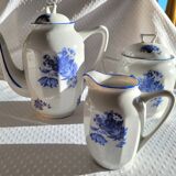 Blue and white ceramic coffee service with flowers.