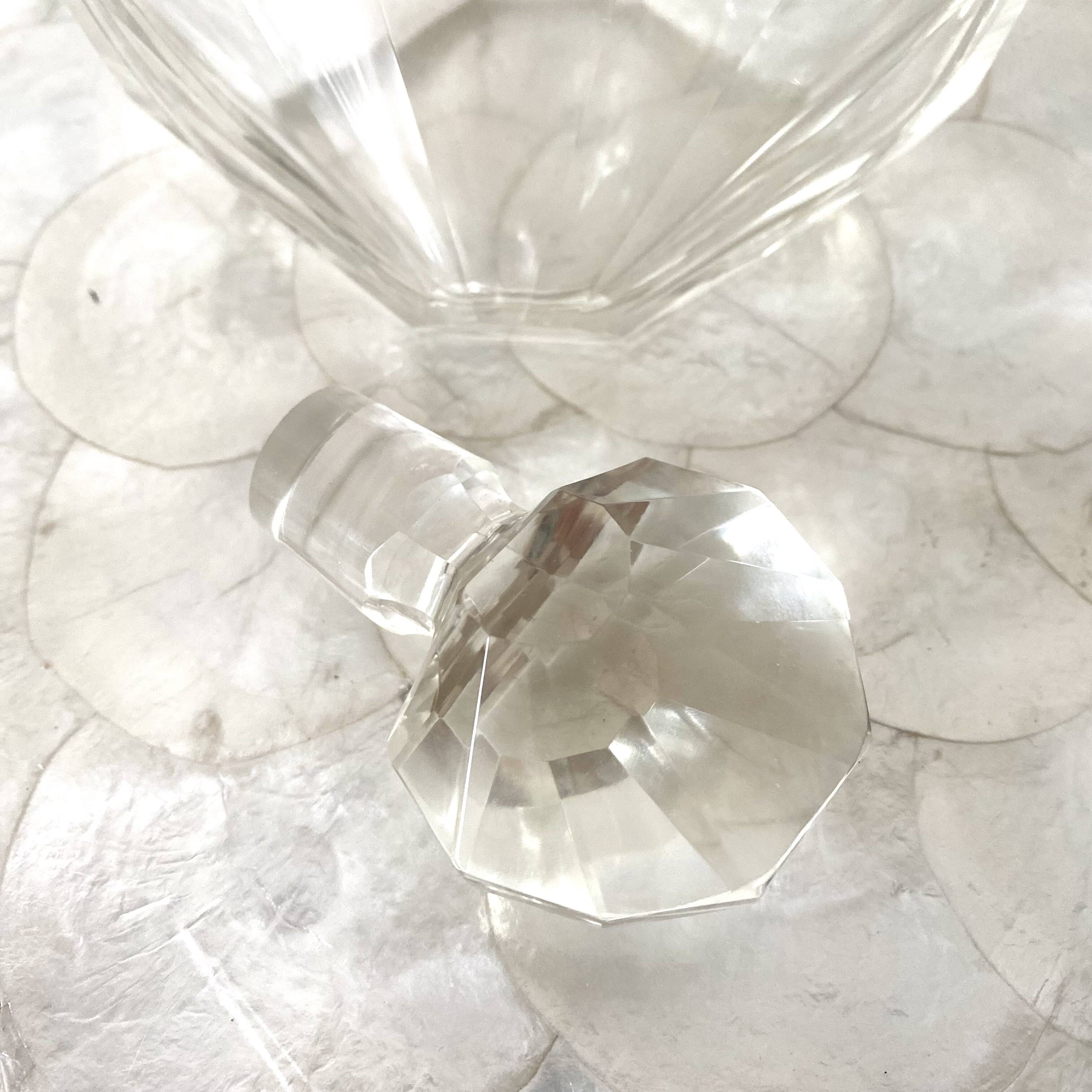 Stylized shell-shaped carafe