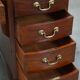 Antique English wooden desk from the late 19th century with a leather top