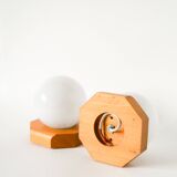 Pair of globe wall lights in opaline with a pine base, 1980.