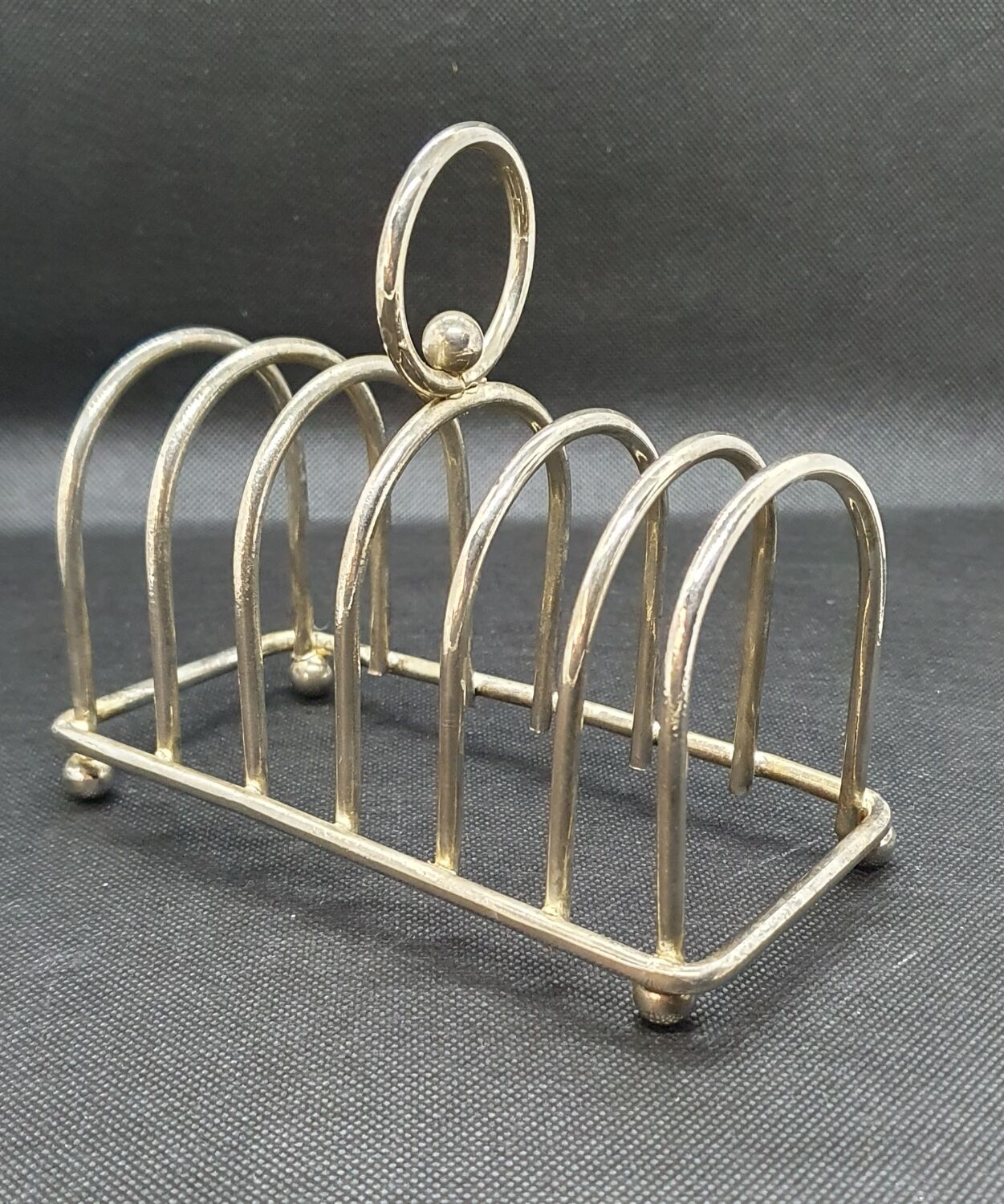 Toast holder in silver metal
