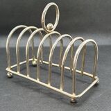 Toast holder in silver metal