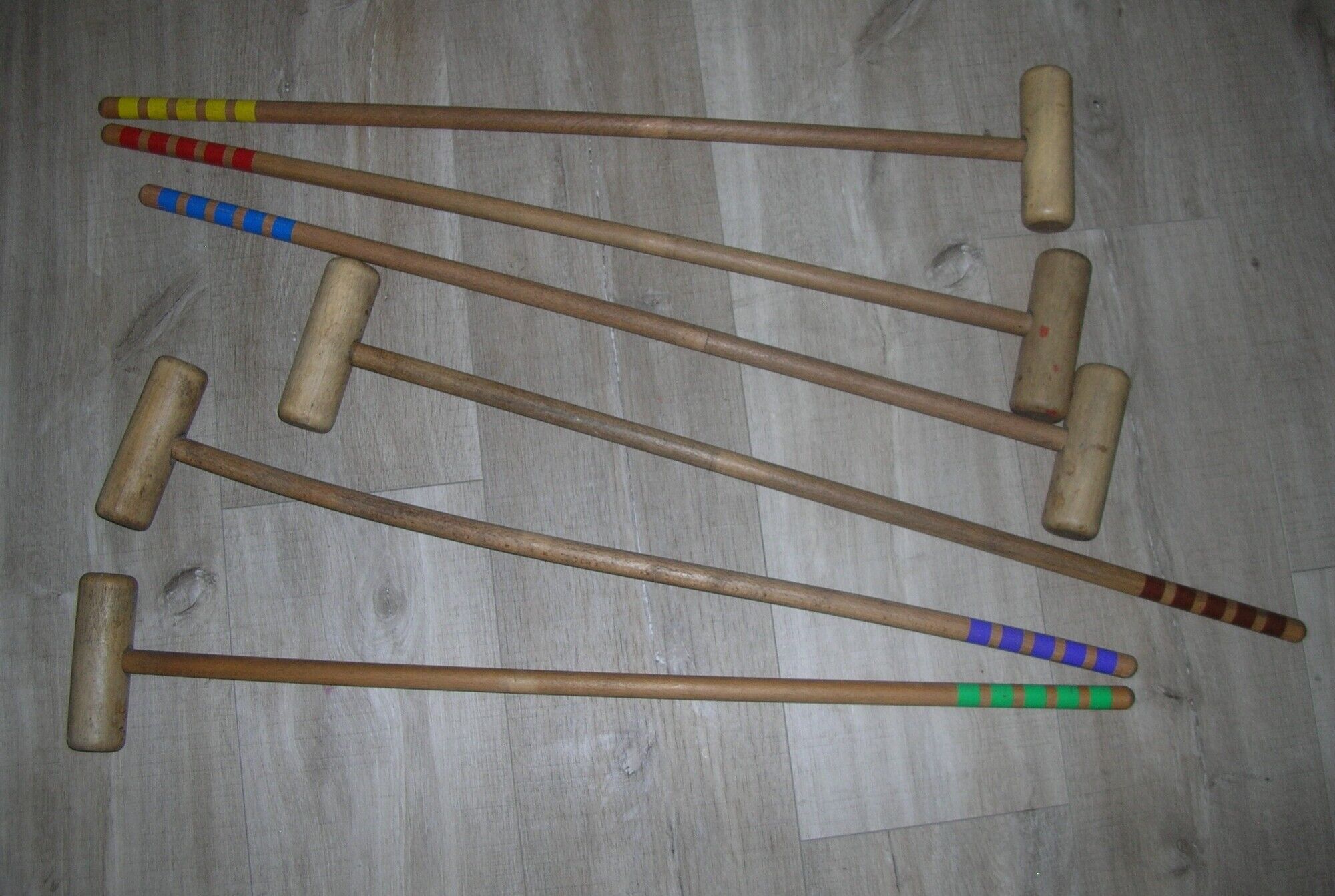 Wooden garden croquet game in its metal cart