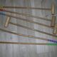 Wooden garden croquet game in its metal cart