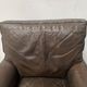 Pair of vintage brown leather armchairs from the 1970s.