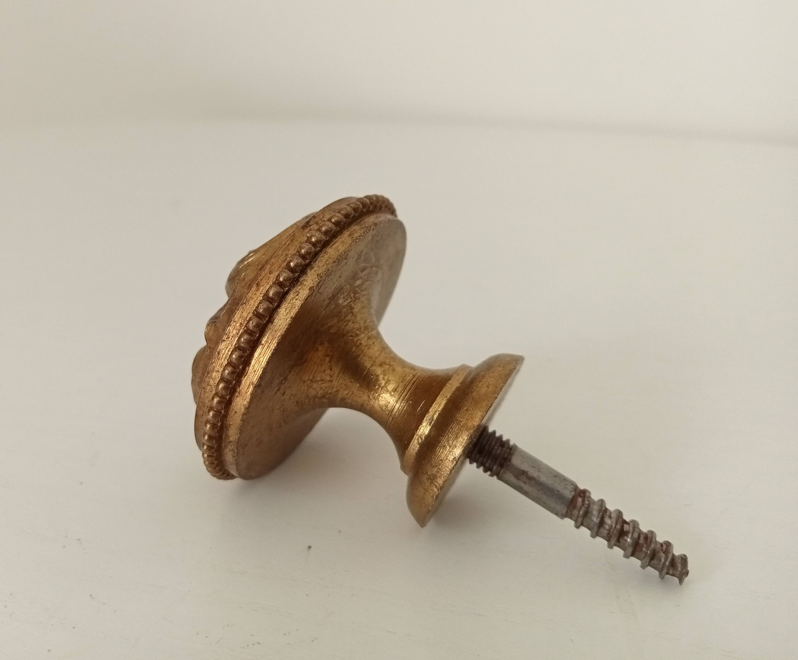 Antique furniture handle in chiseled solid bronze