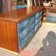Corner base cabinet in solid Pao Rosa wood with 8 drawers and blue Alcantara lining