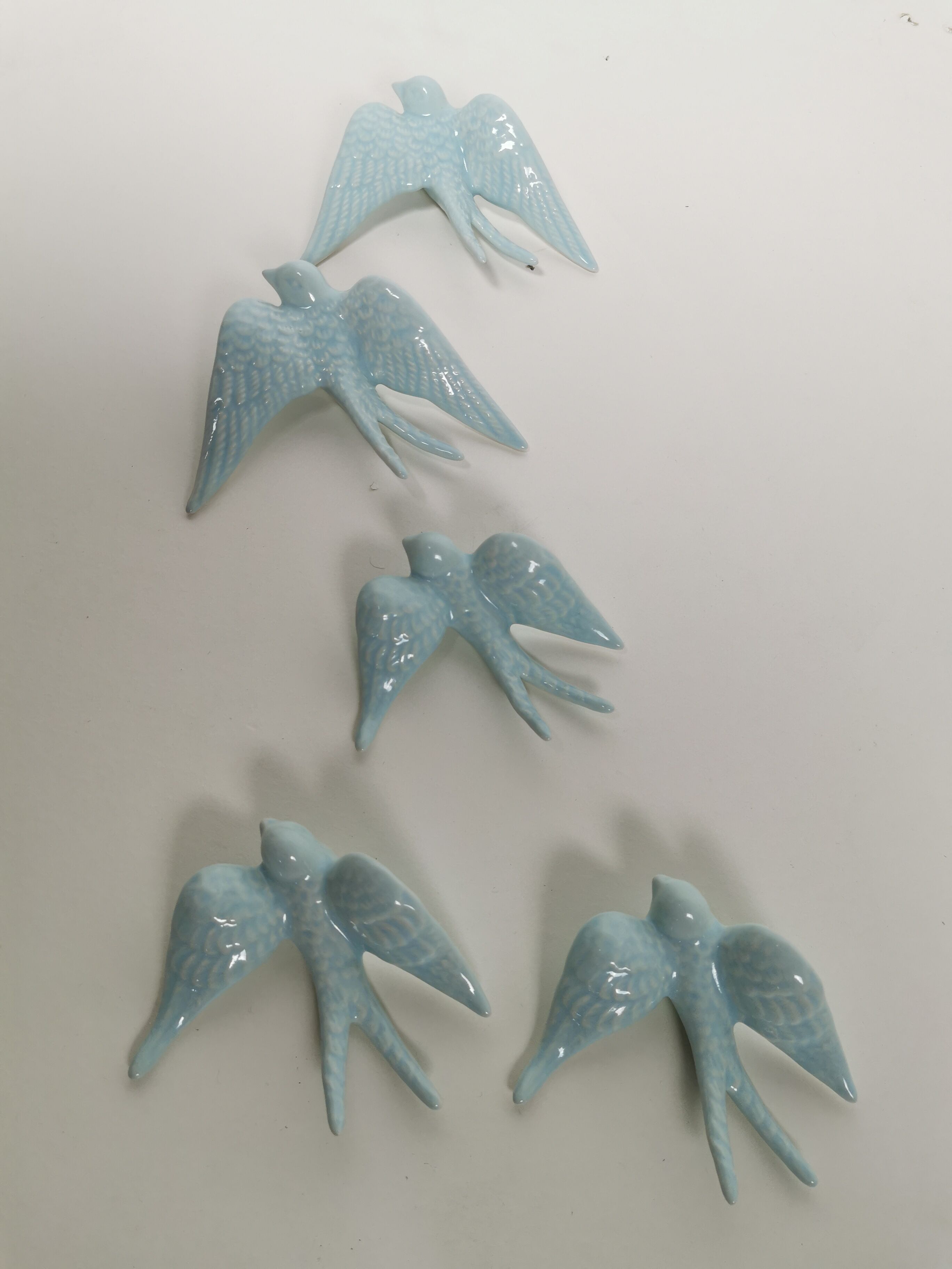 Batch of swallows in ceramic