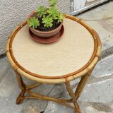 Round coffee table in vintage rattan