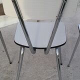 Table and 4 chairs in white formica