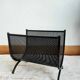 Cast iron magazine rack, circa 1950