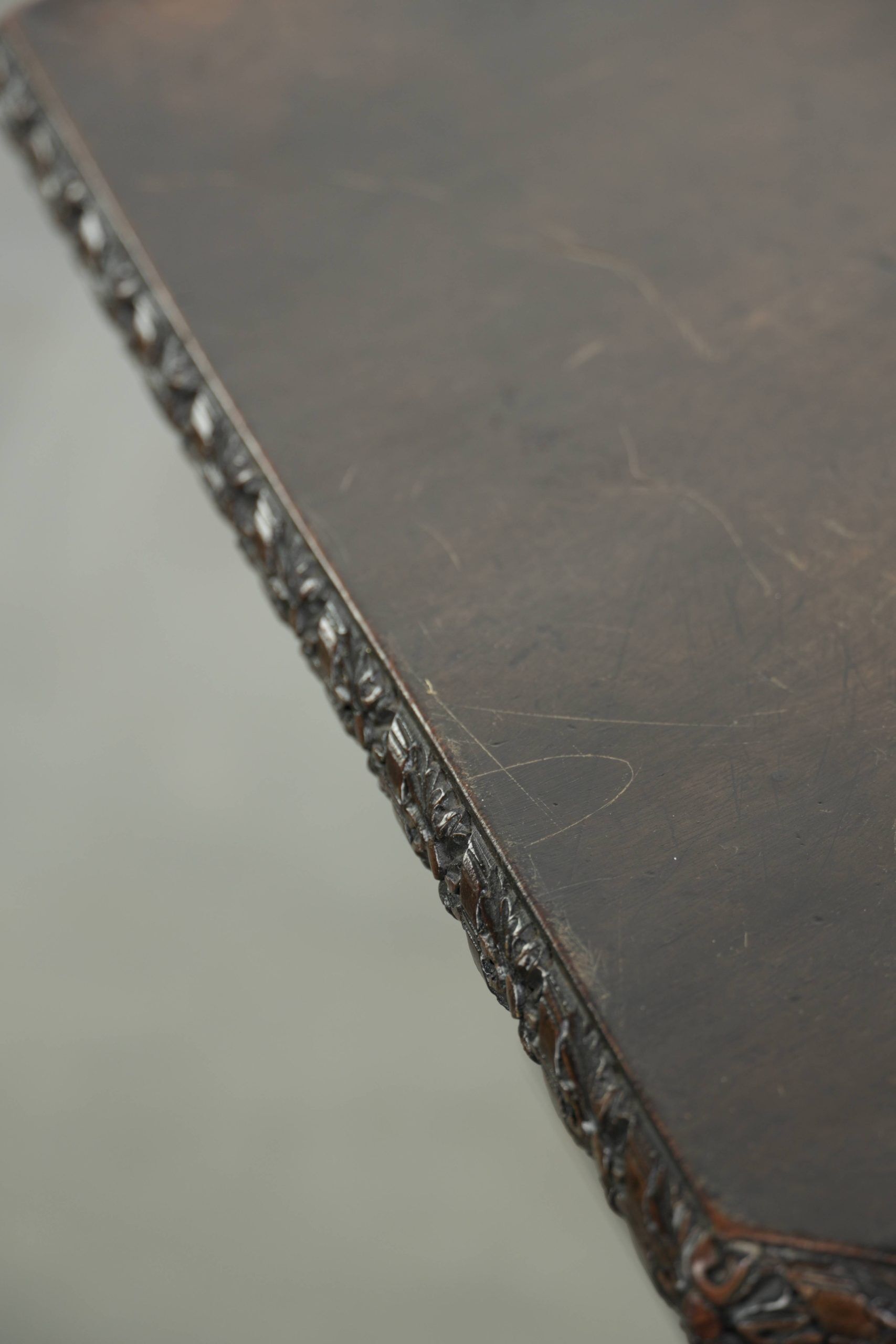 Antique wooden English rotating book table/side table from the 19th century