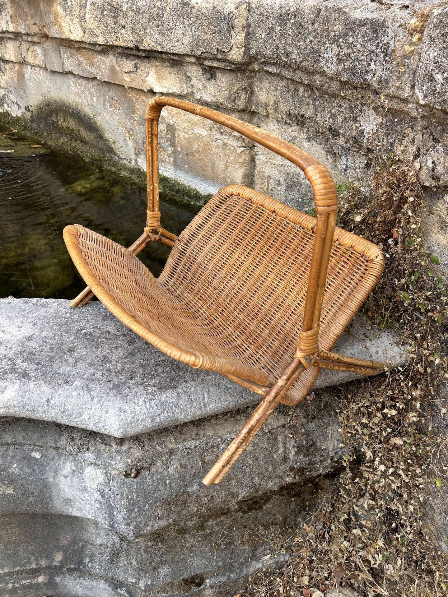Rattan magazine rack