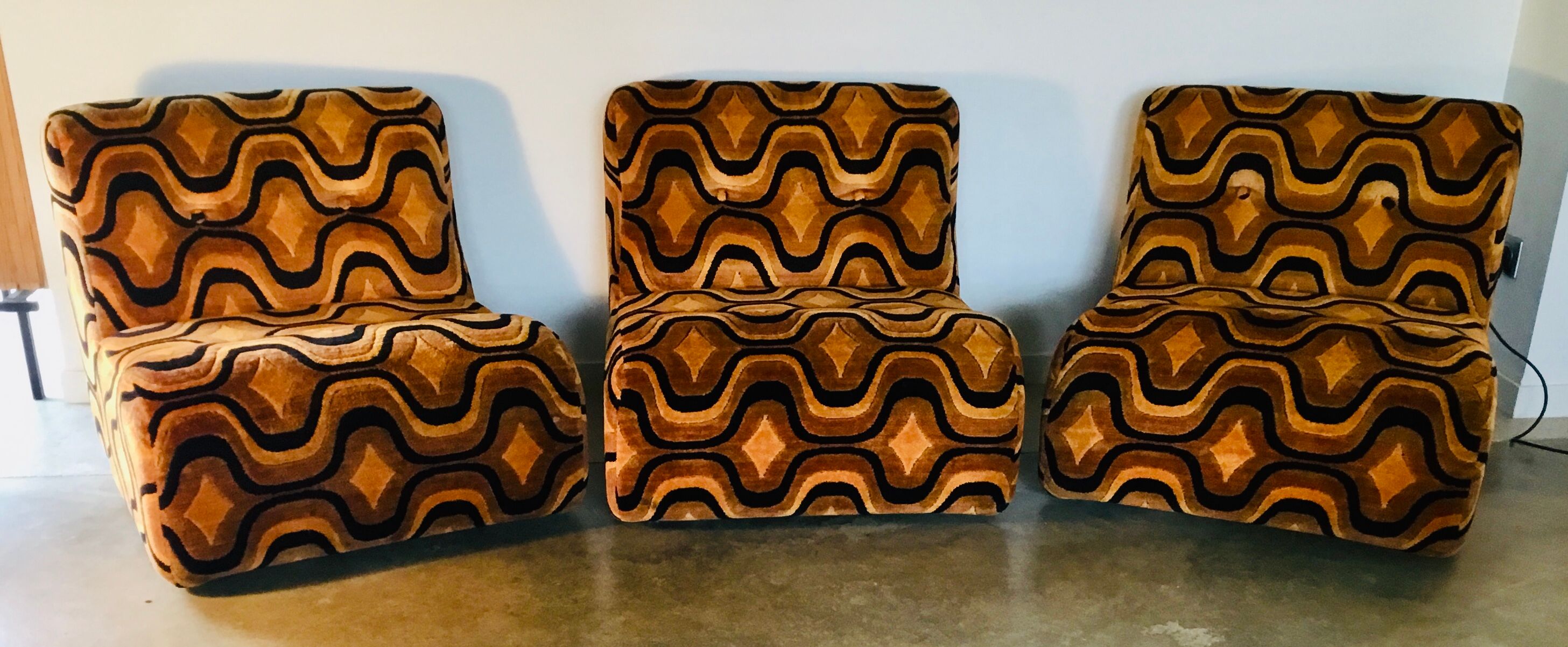 Vintage 1970s orange geometric patterned space-age armchair
