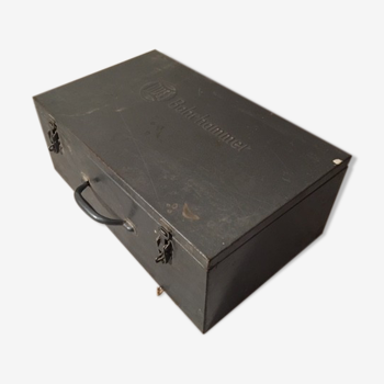A crate, box or metal suitcase in undue style 60/70