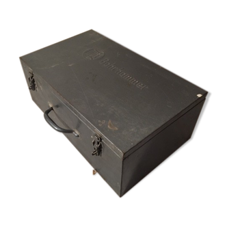 A crate, box or metal suitcase in undue style 60/70