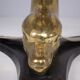 Solid brass dolphin console feet.