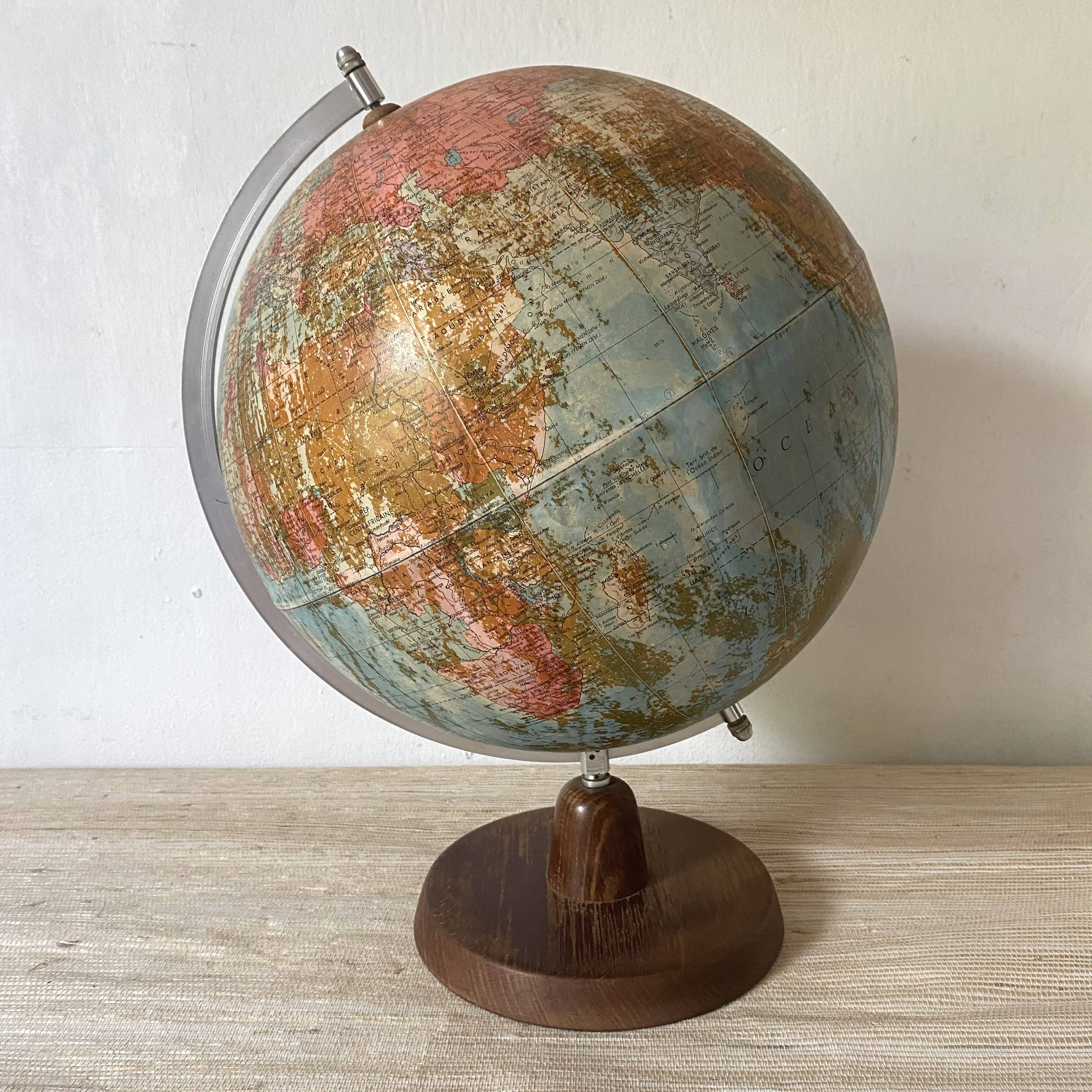 Old terrestrial globe with wooden base H46 cm