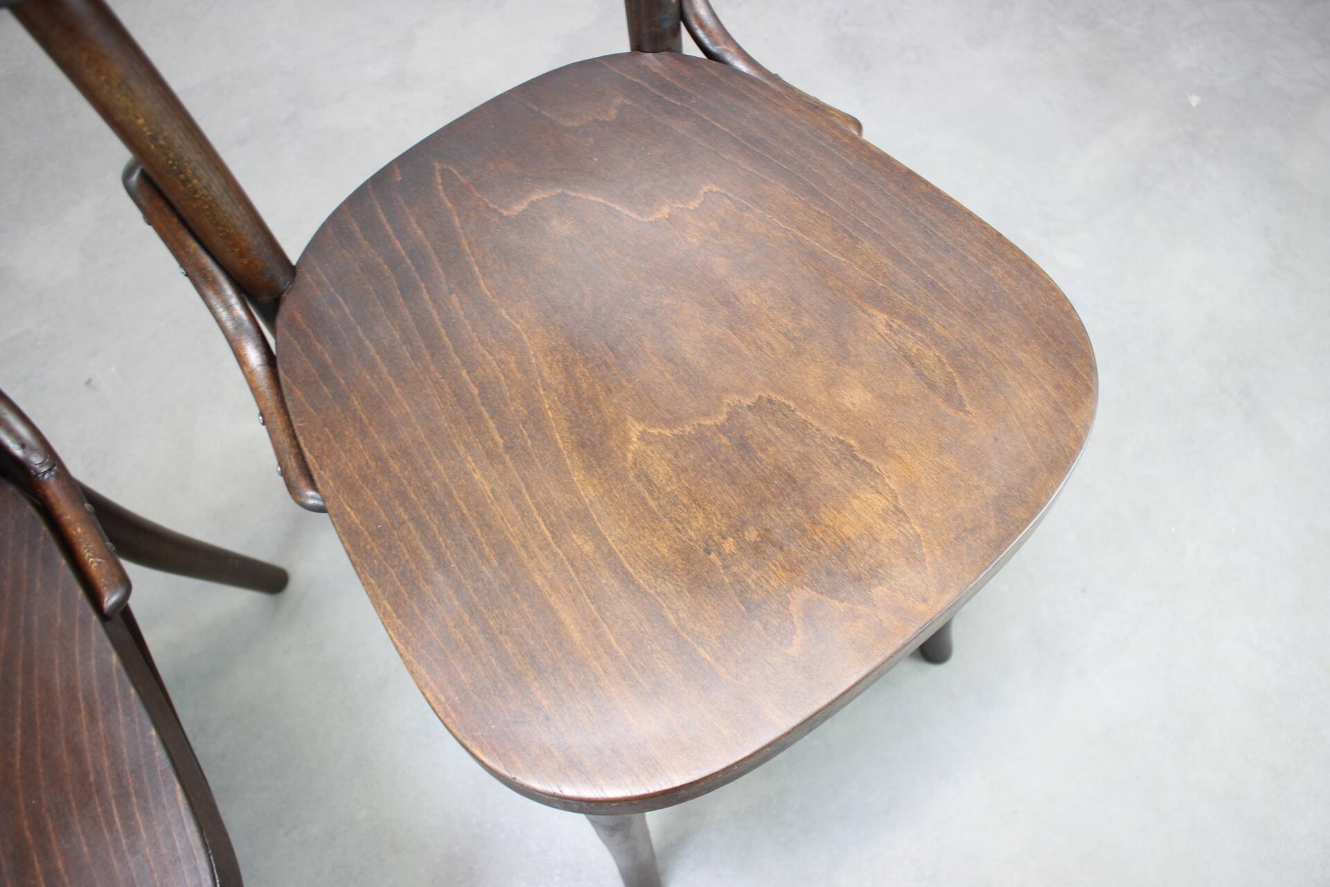 Pair of antique armchairs Model No B28 by Thonet, bent wood and caning, Austria 1920s.
