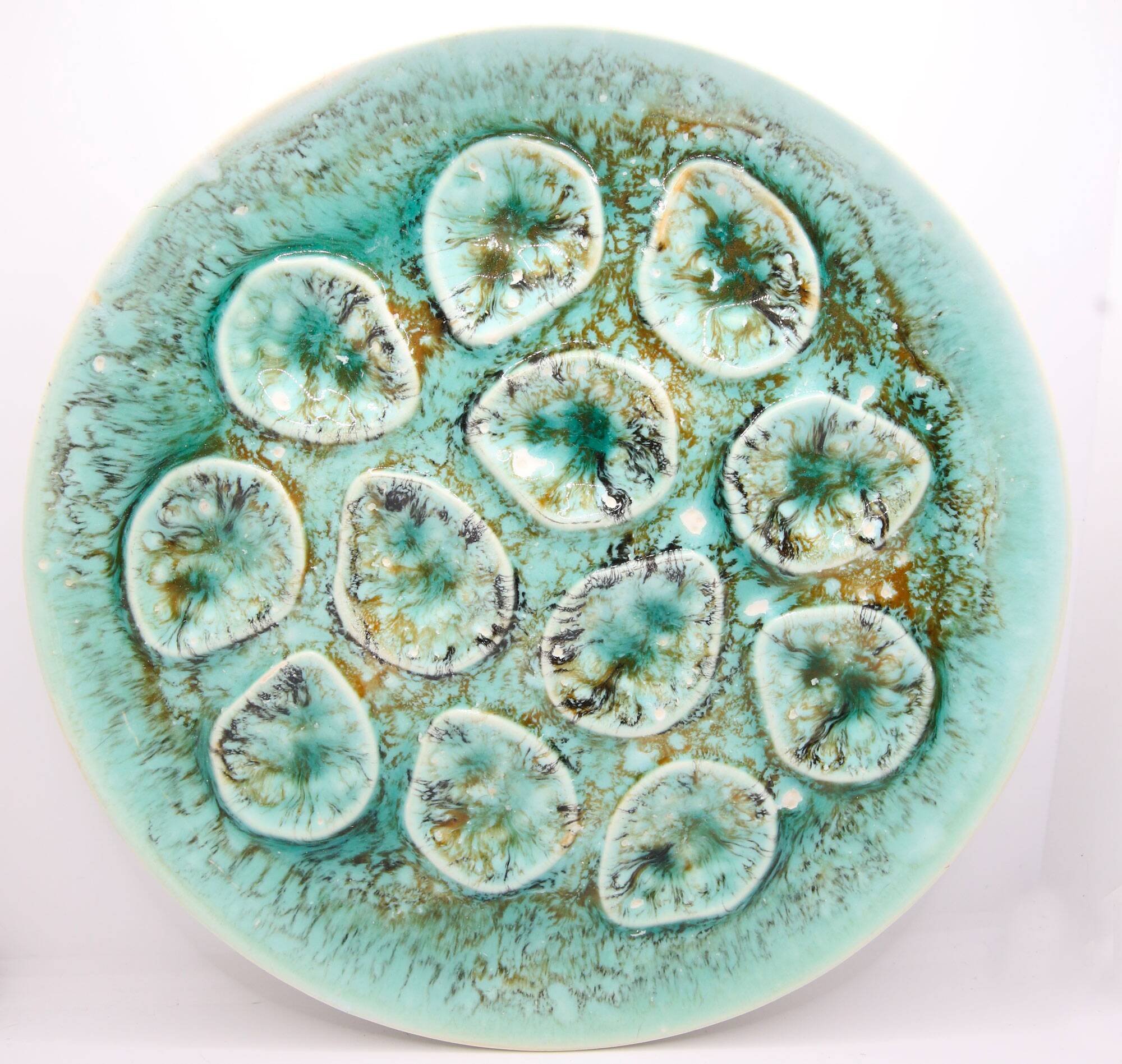 Oyster plate in turquoise earthenware from Niderviller Mousse collection