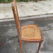 2 Art Deco chairs from the 1930s, made of solid wood with caning.