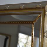 Large mirror with gilded and carved wooden glazing beads