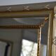 Large mirror with wooden gilded and carved frame.