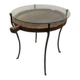 decorative wrought iron round table, glass and wood top.