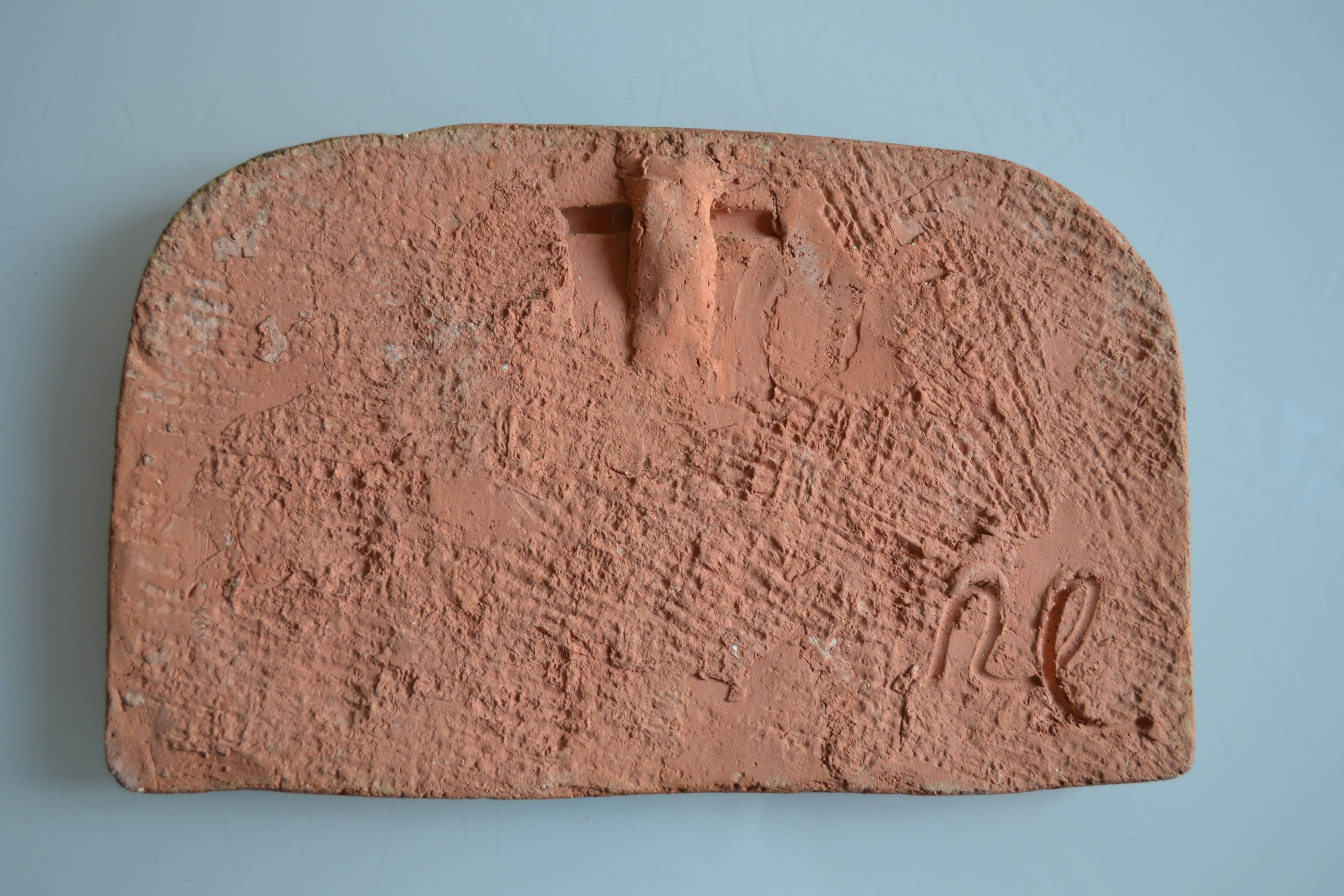 Bas-relief sculpture in terracotta inspired by the Celtic bestiary