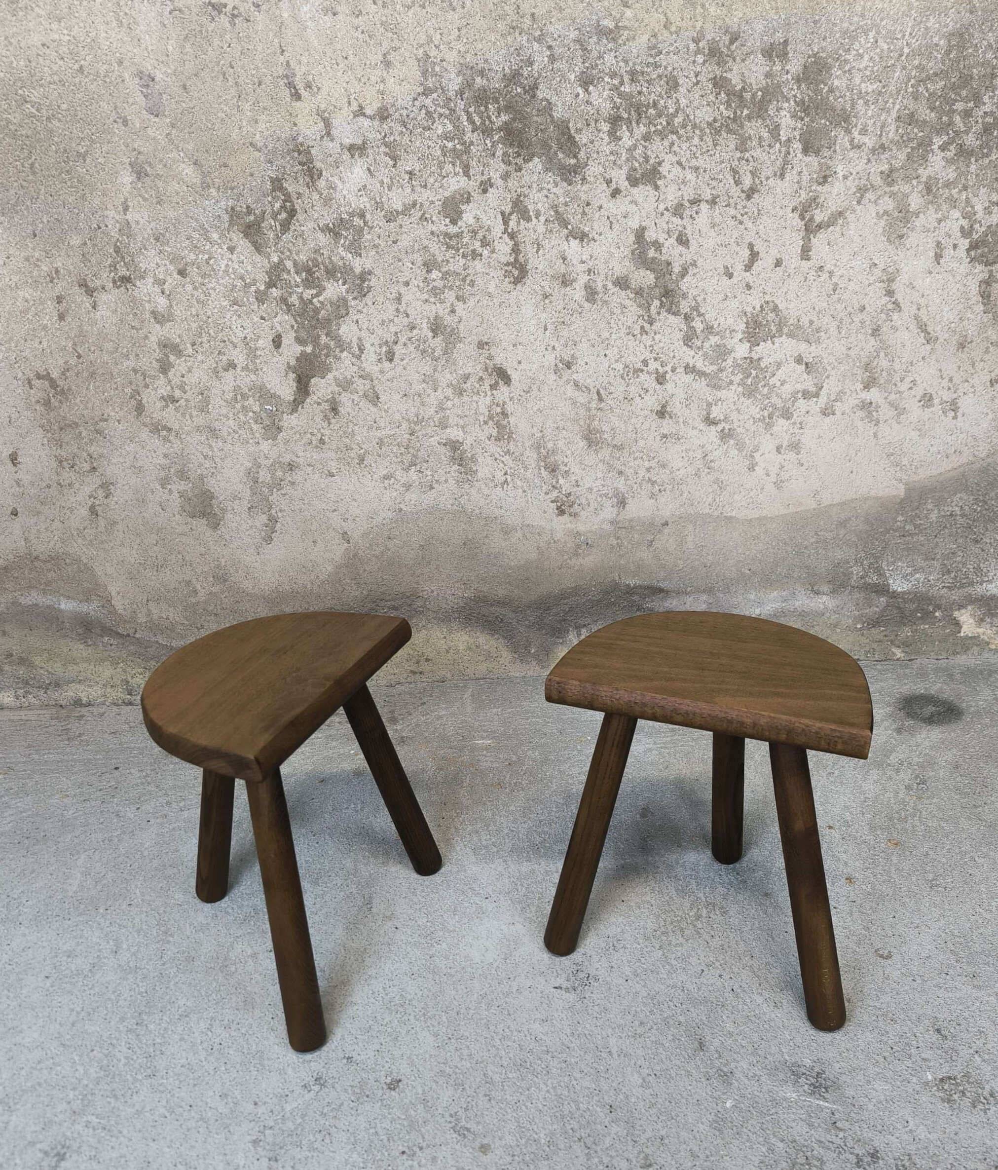 Vintage wooden tripod stool pair.