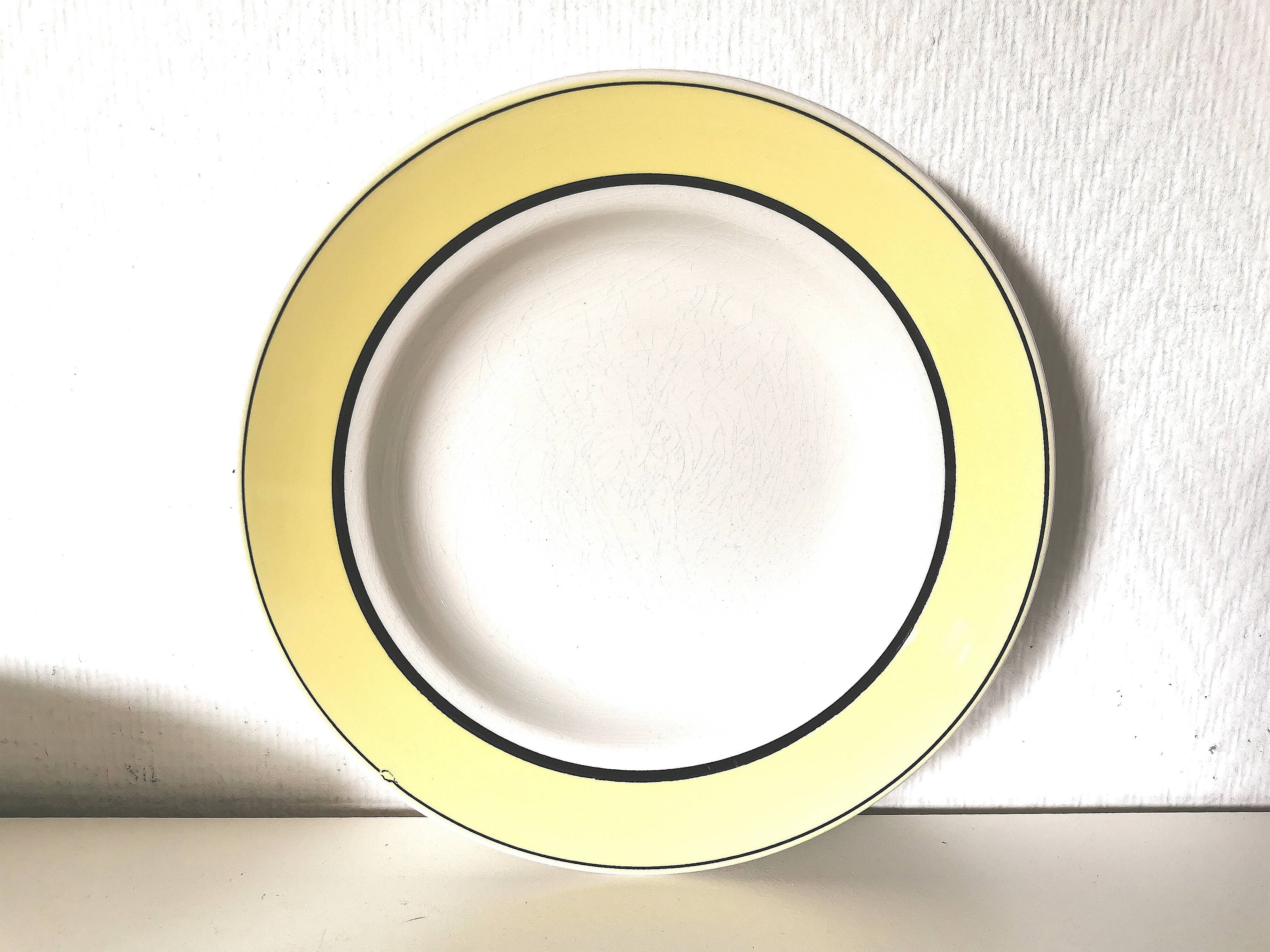 set of 5 soup plates / circle / yellow / black edges / Lunéville