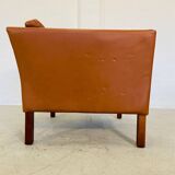 Fauteuil lounge scandinave vintage en cuir cognac, style milieu du siècle