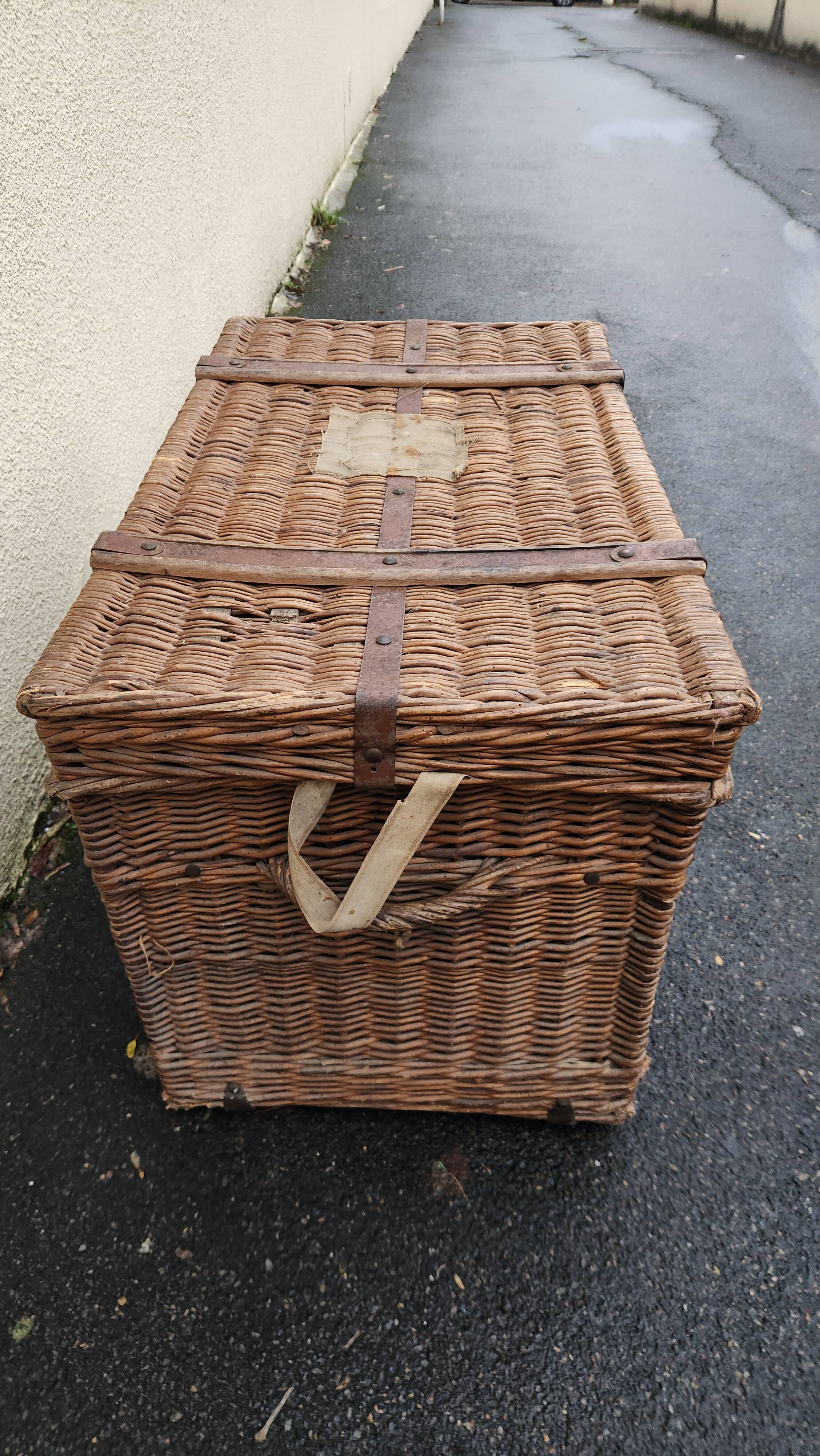 Antique vintage rattan and wicker travel trunk from the 1900s