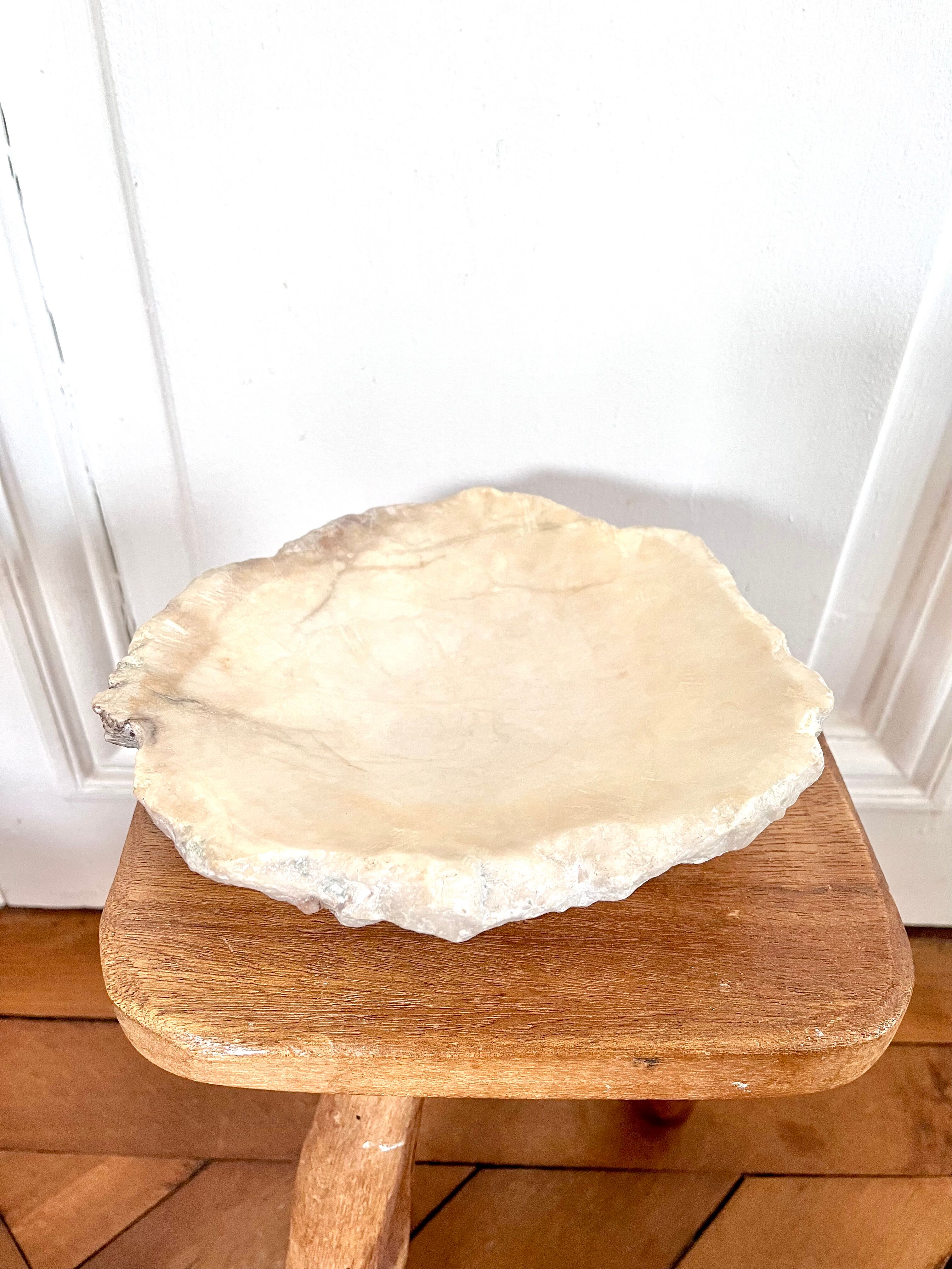 Large ashtray dish made of marbled alabaster.