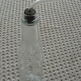 Old bottle with glass pipette