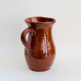 Vintage pitcher in glazed earth