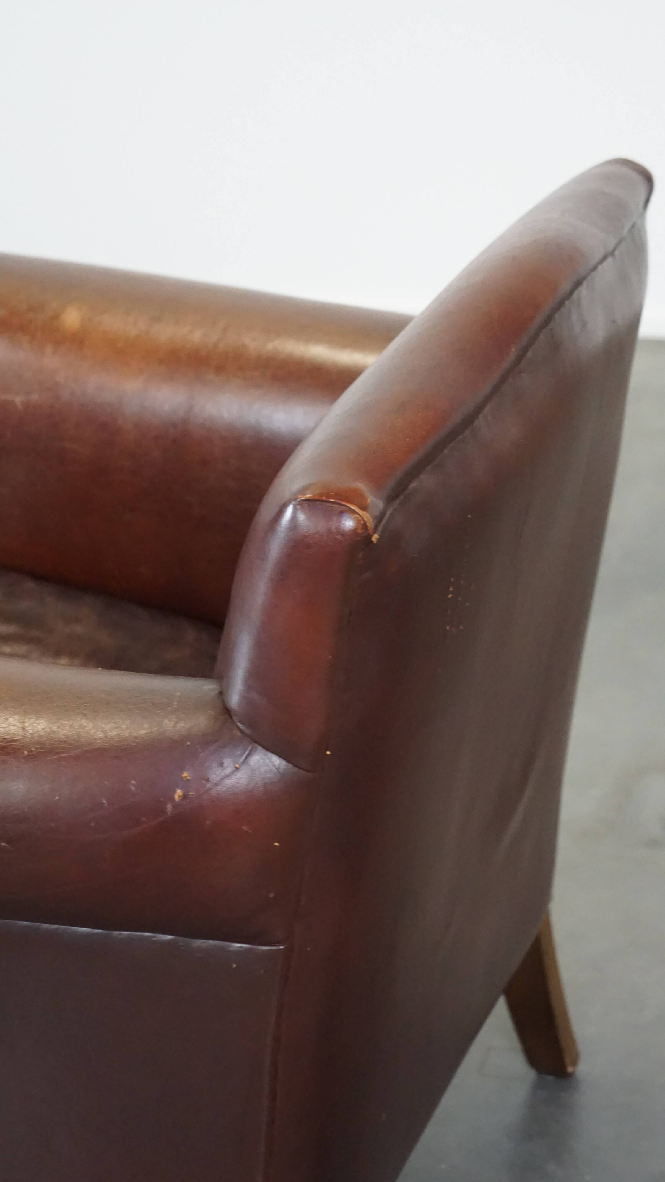 Design armchair made of sheep leather with a clean finish