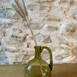 Green blown glass carafe
