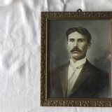 Authentic old photograph portrait of a handsome man with mustache 1920 - 1930