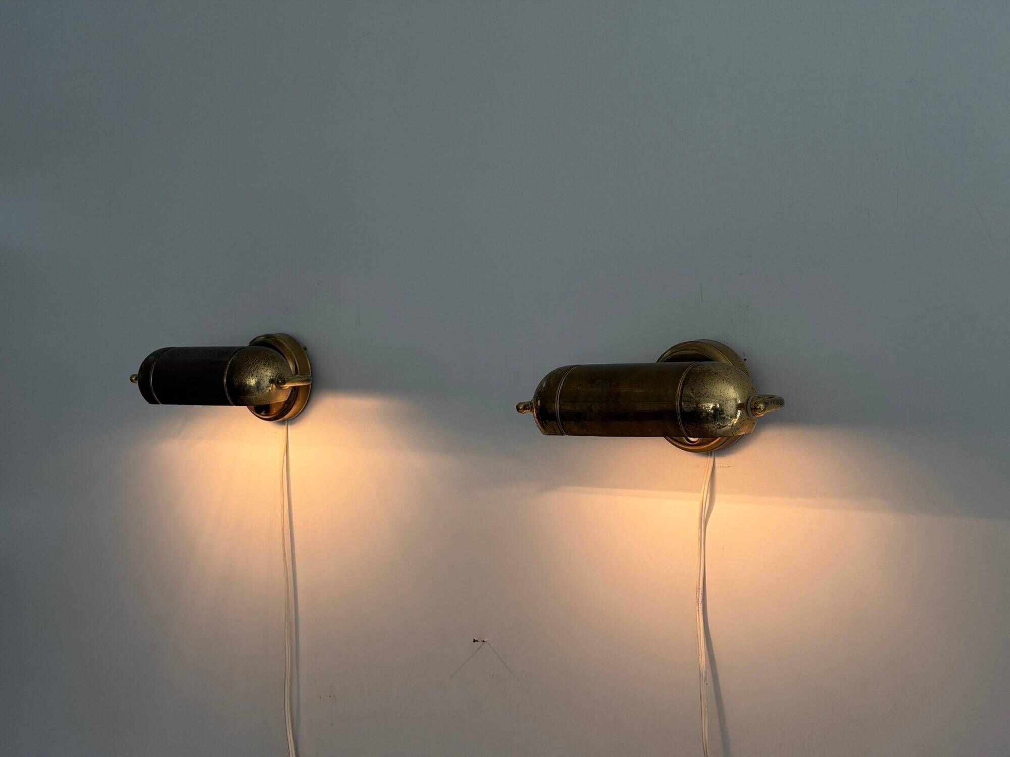 Pair of brass wall lights from the mid-century by N Leuchten, 1960s, Germany.