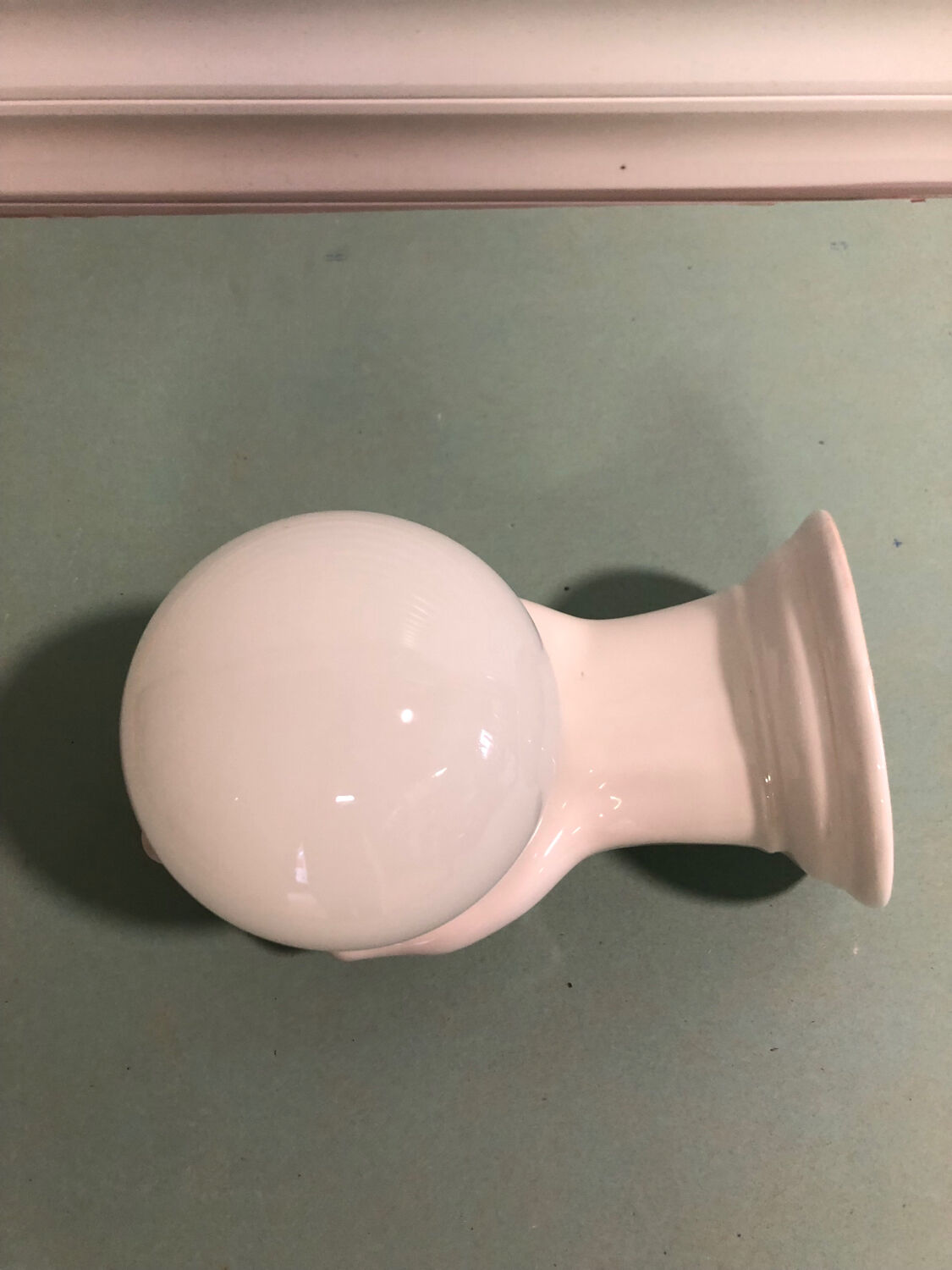Ceramic hand wall lamp