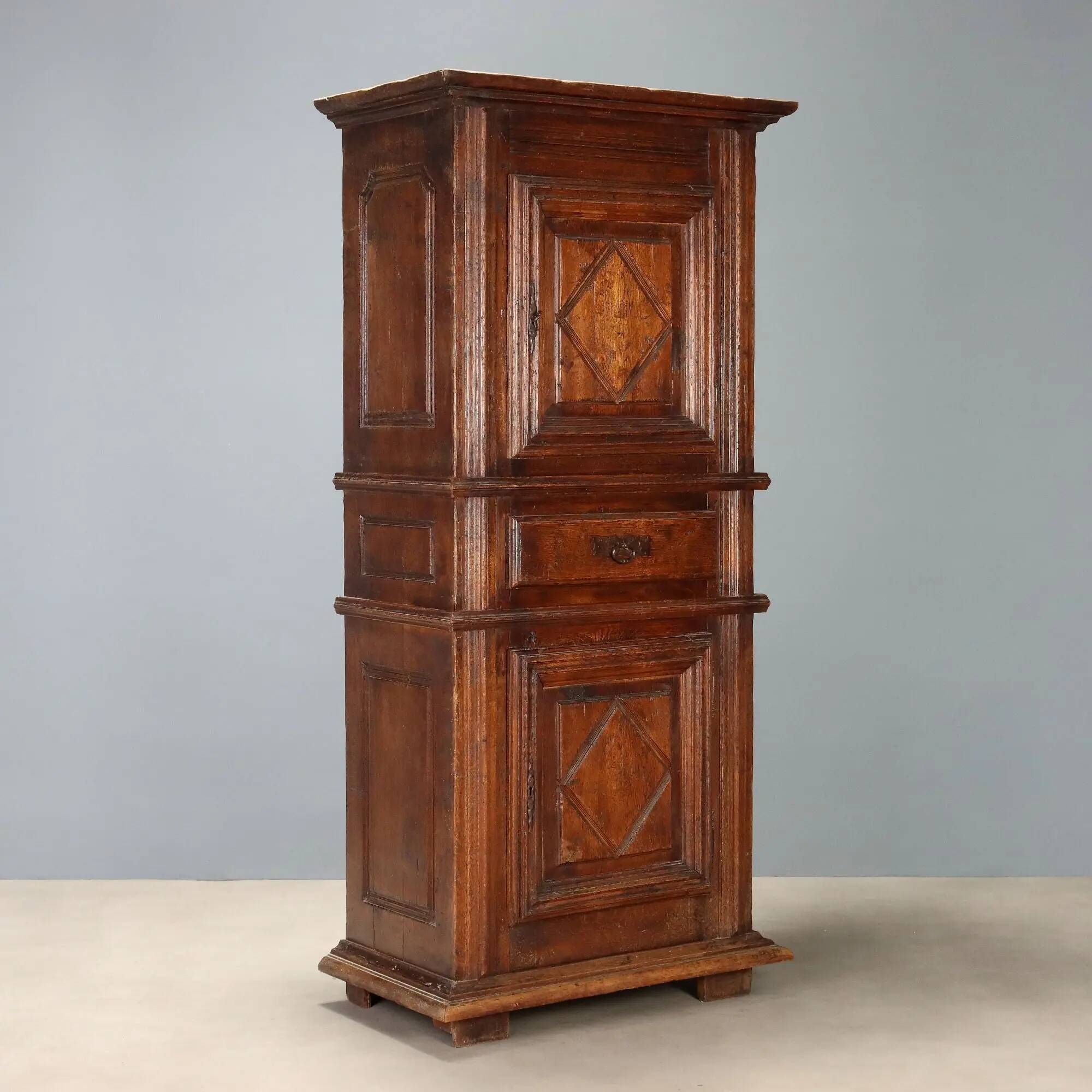 Antique baroque wardrobe in oak with safe, Italy, late 19th century.
