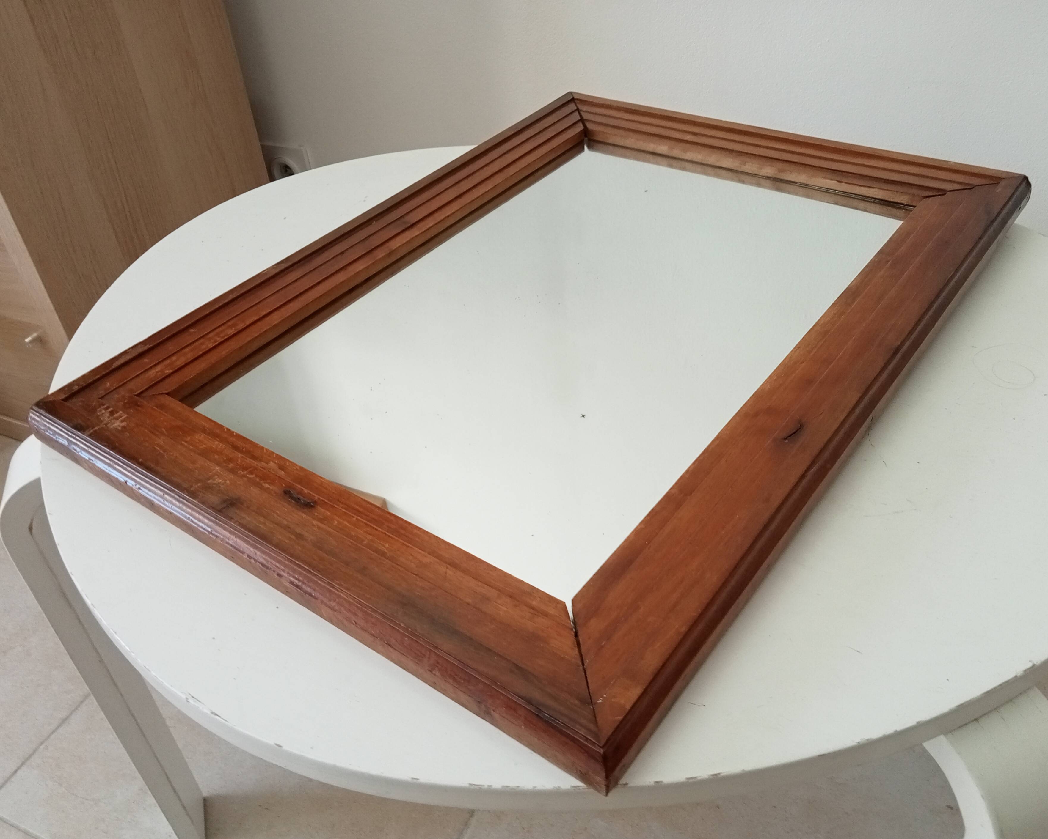 Vintage Art Deco wooden mirror from the 1950s.