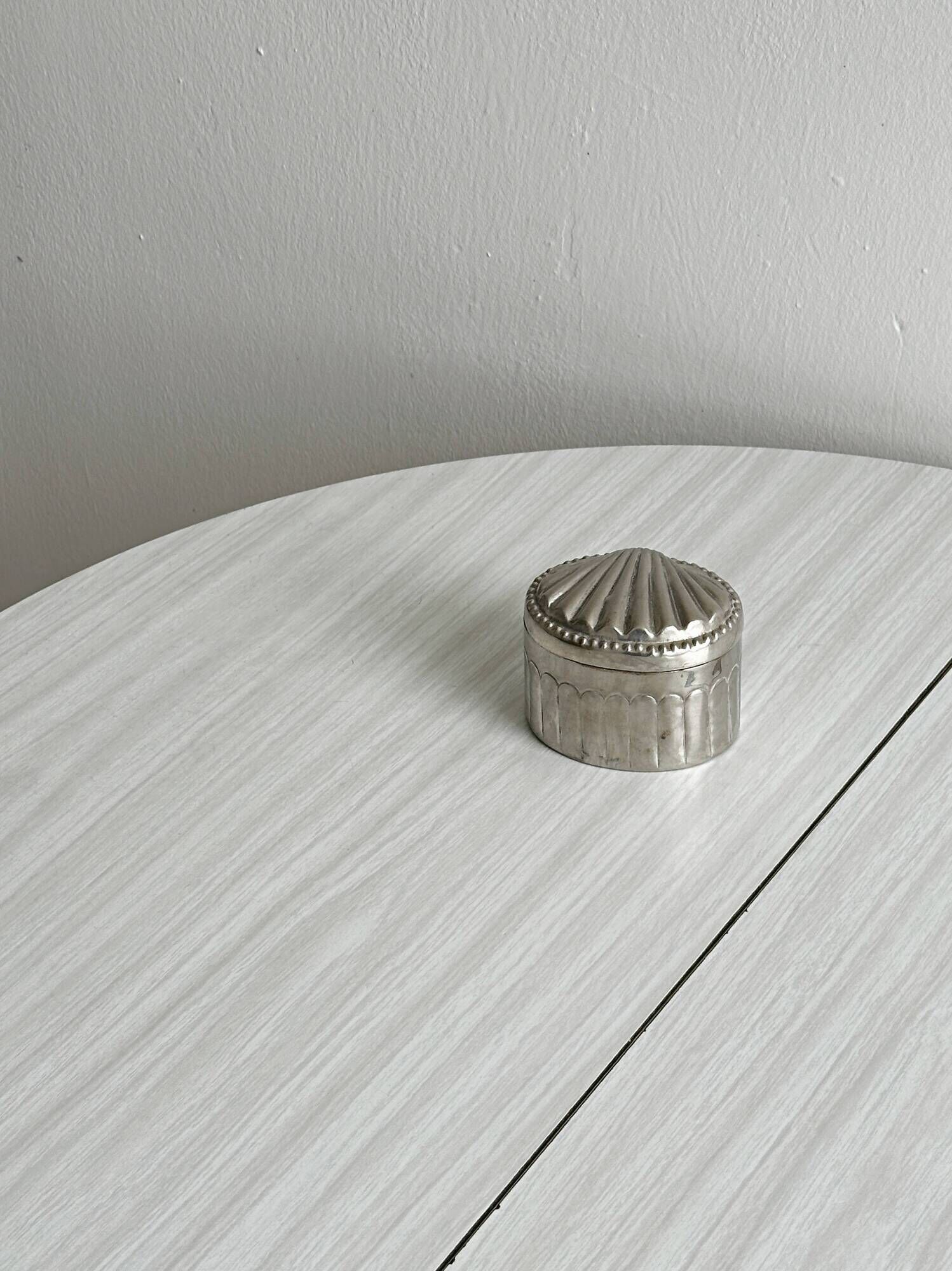 Silver-plated metal catchall with patina
