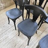Set of 7 black bistro chairs