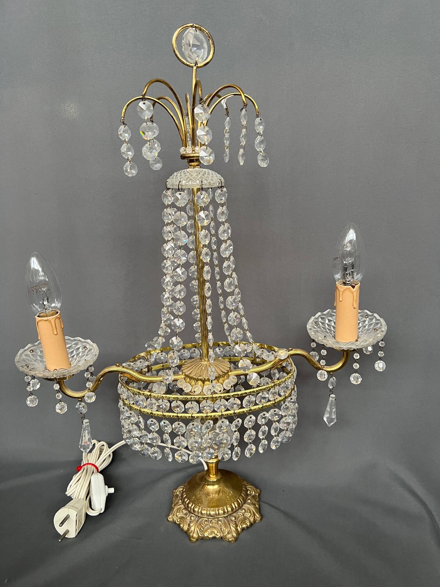 Girandole. Brass, crystal, bronze.