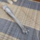 Silver sugar tongs with classic decoration